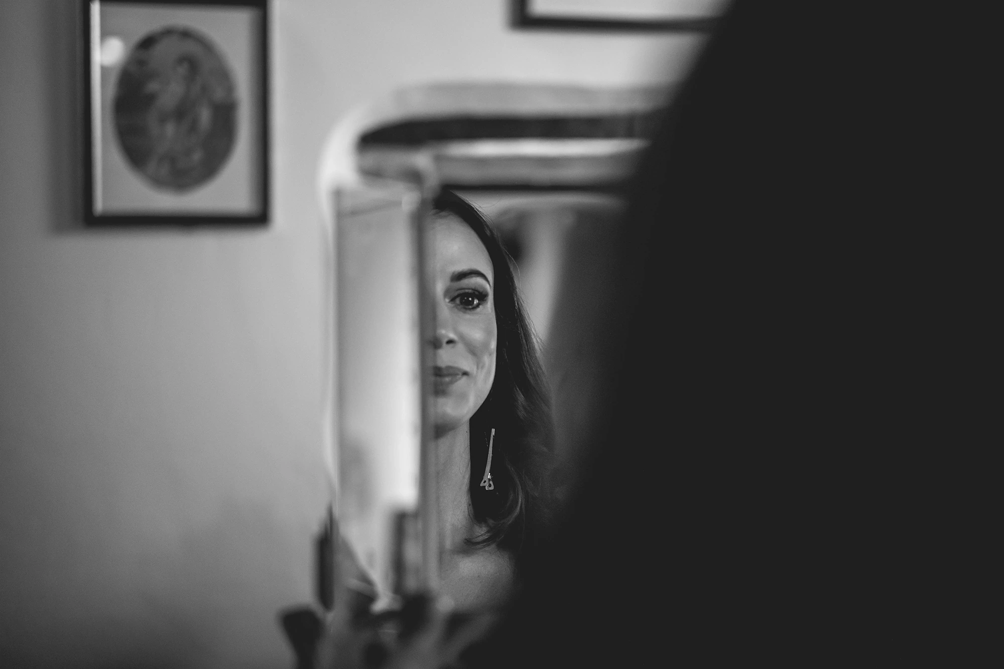 A face reflected in a small mirror.