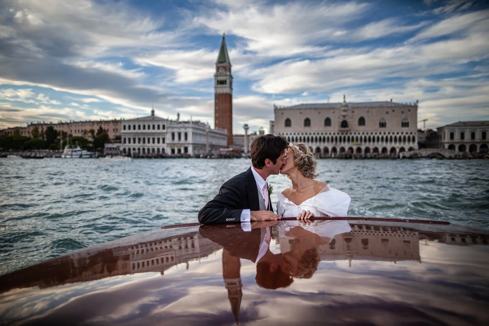 A kiss on the boat, before St Mark's Square and the Doge's Palace.