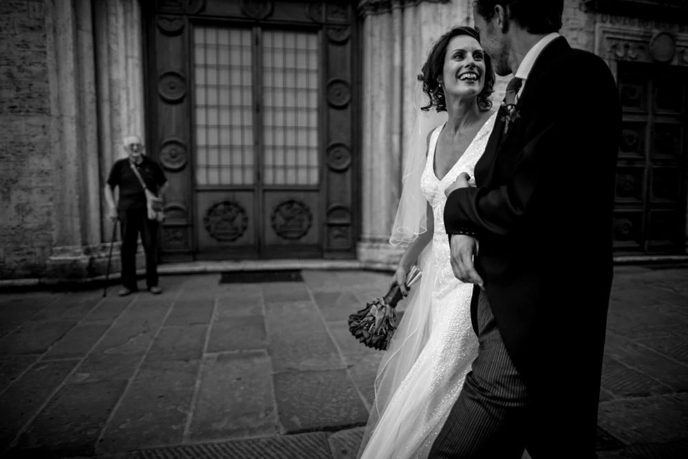 Out of the church doorway, the couple set off.