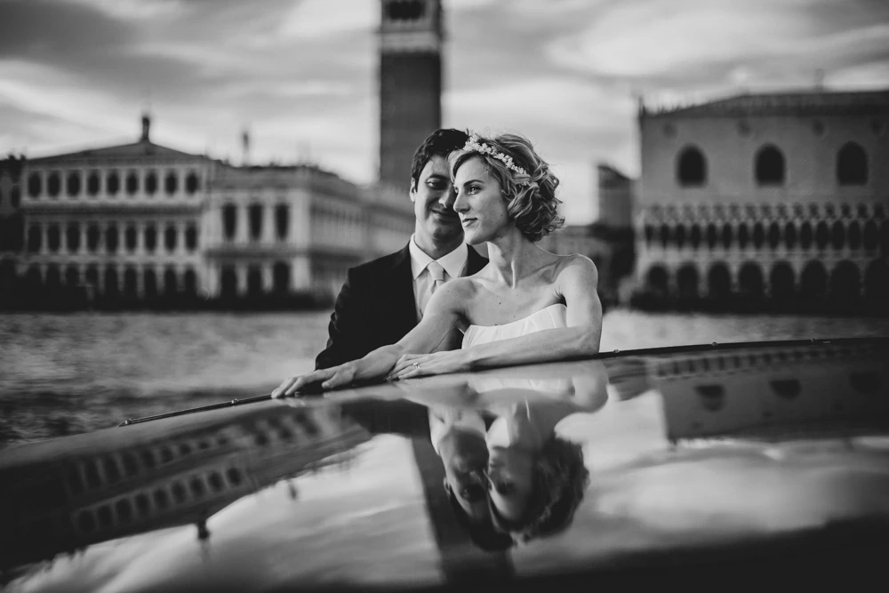 On the boat, before the Doge's Palace and the campanile.