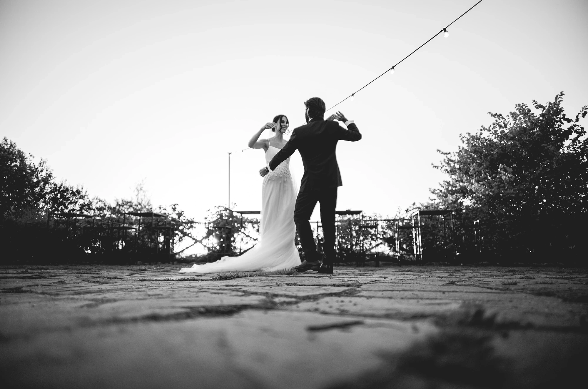On the terrace against the sky, the first dance.