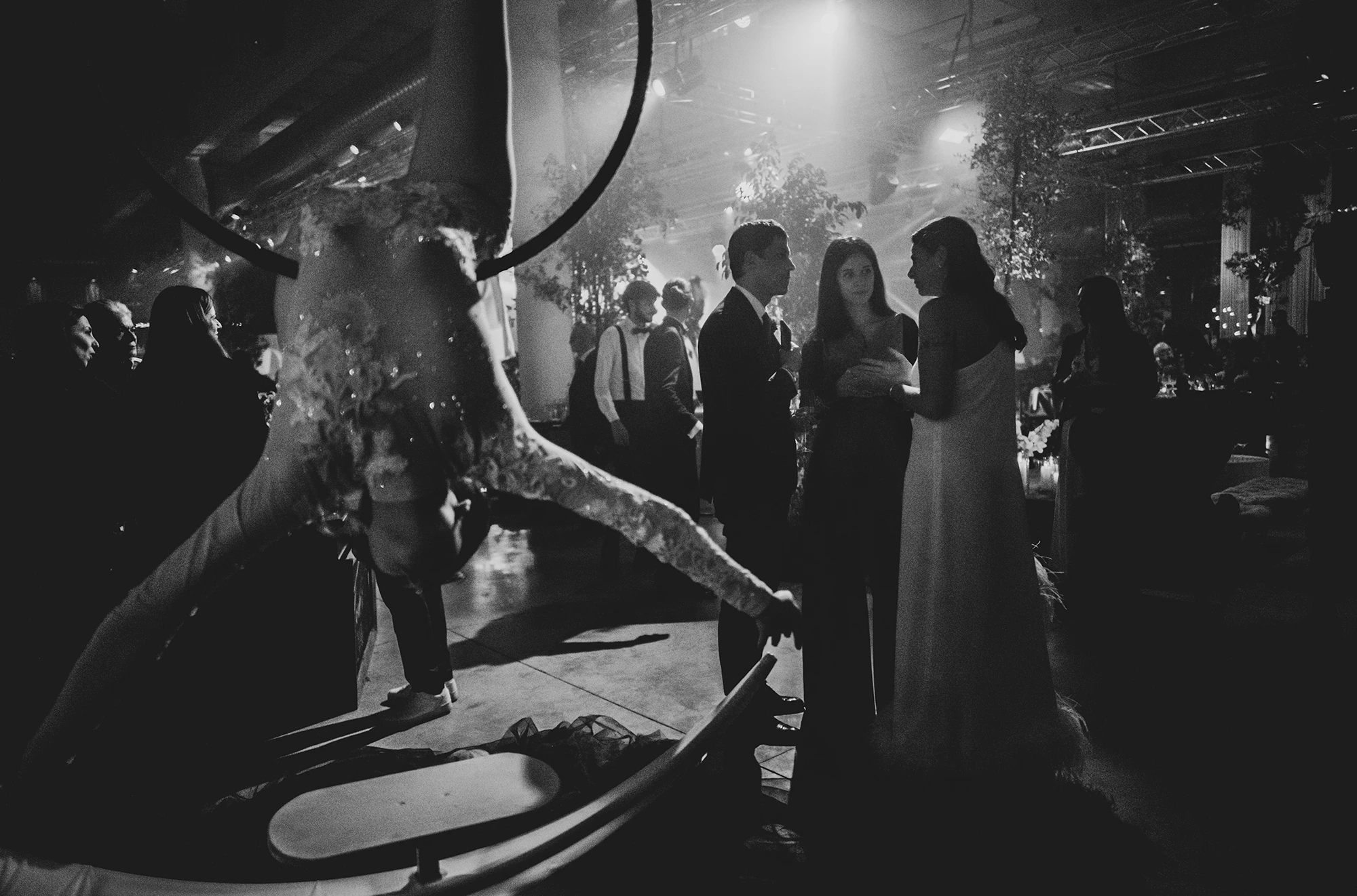 Among the guests, a contortionist performing.